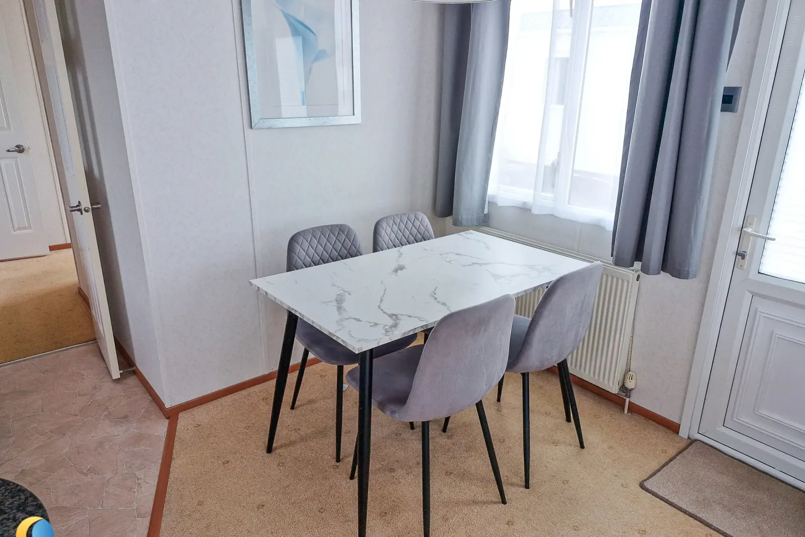 Coastfields 2007 Carnaby Dovedale separate dining area with table and chairs