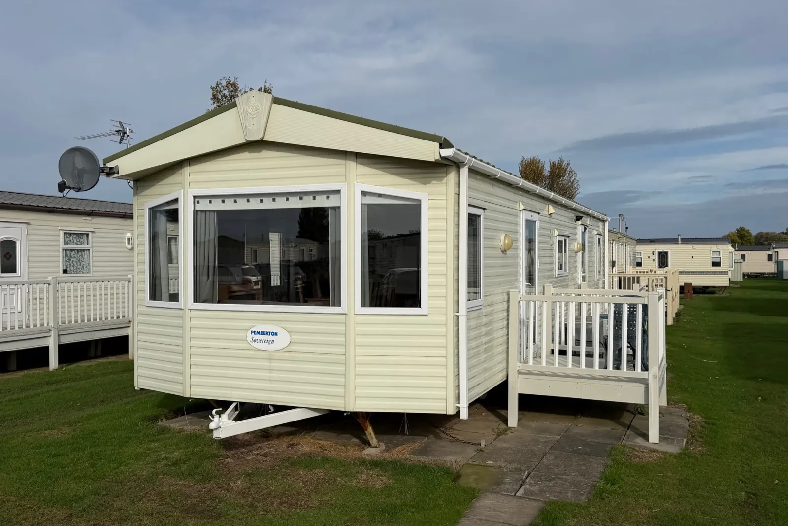 2008 Pemberton Sovereign holiday home with entrance decking at North Shore Holiday Park