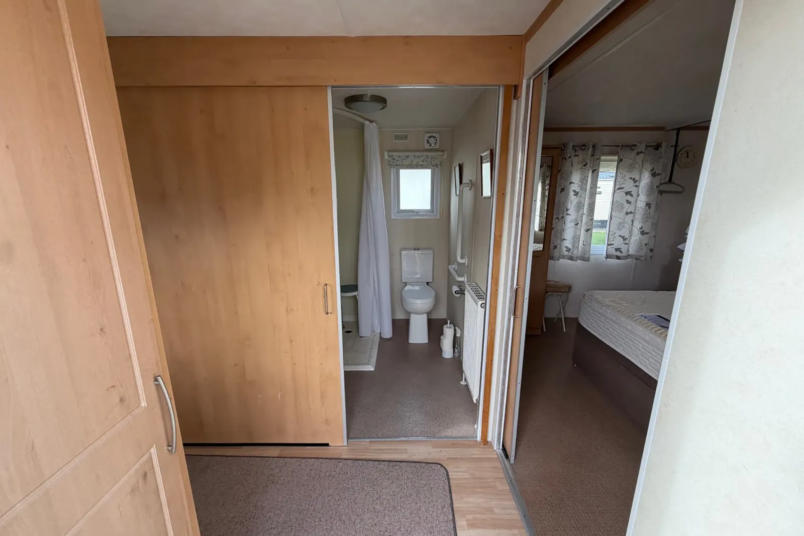 Interior hallway with wood-effect fitted storage in the 2008 Pemberton Sovereign