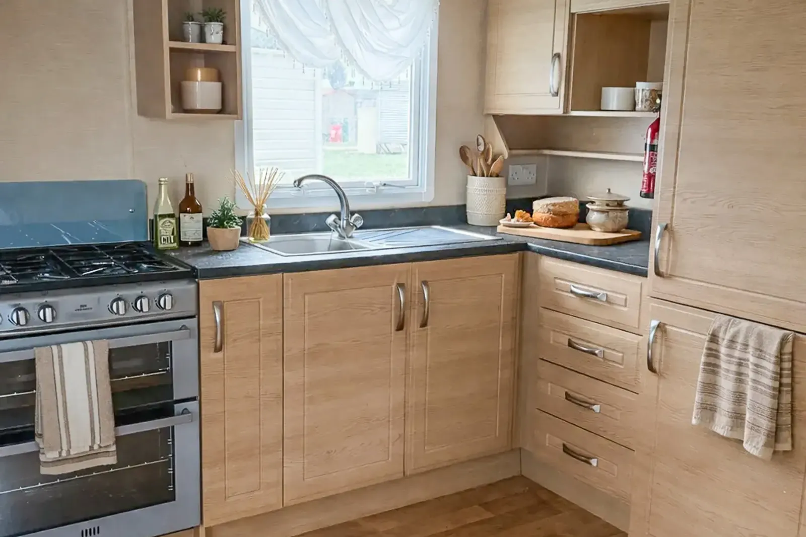 Coastfields 2009 Willerby Granada fitted kitchen with storage and worktop space