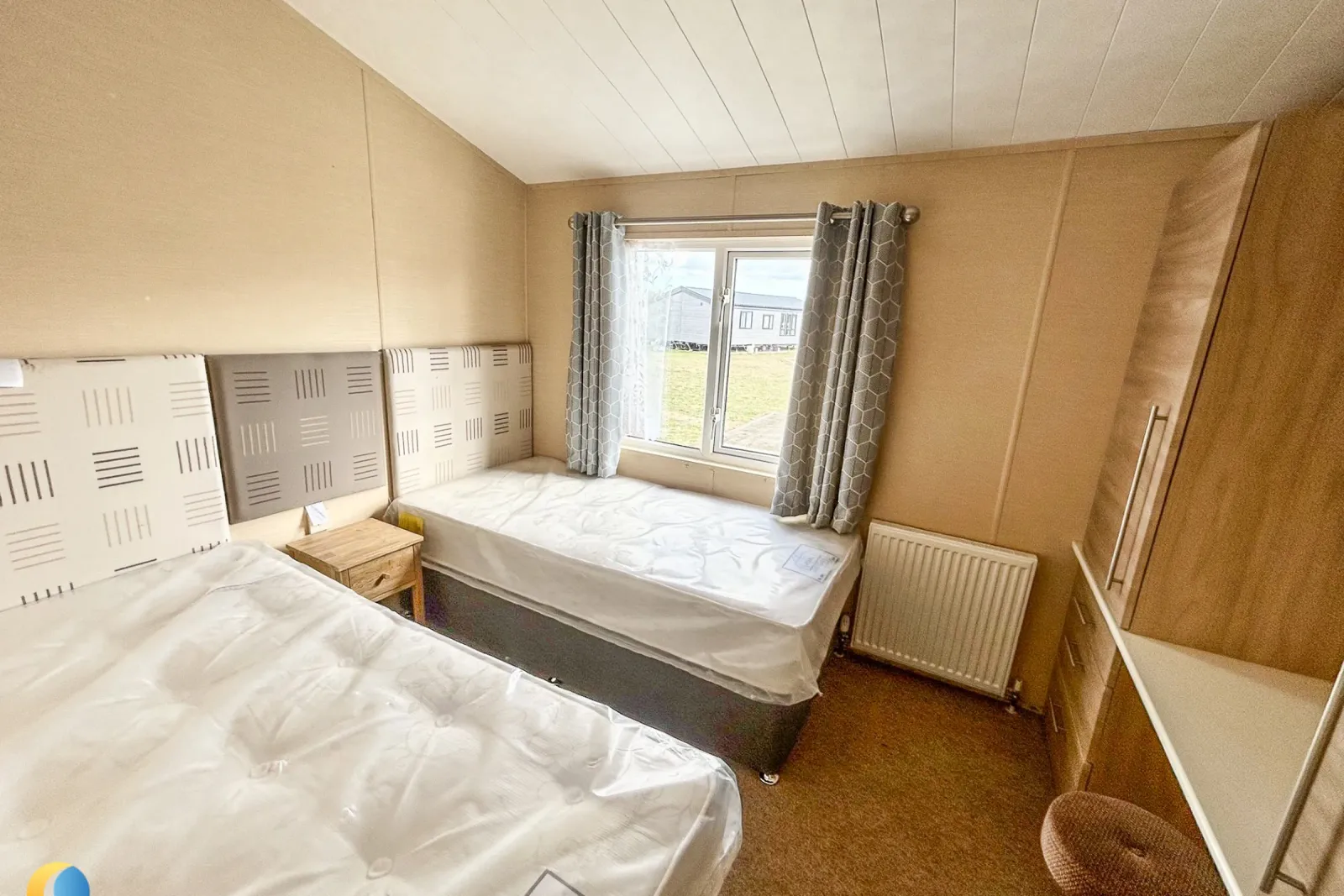 Coastfields 2010 Willerby Boston twin bedroom with fitted storage