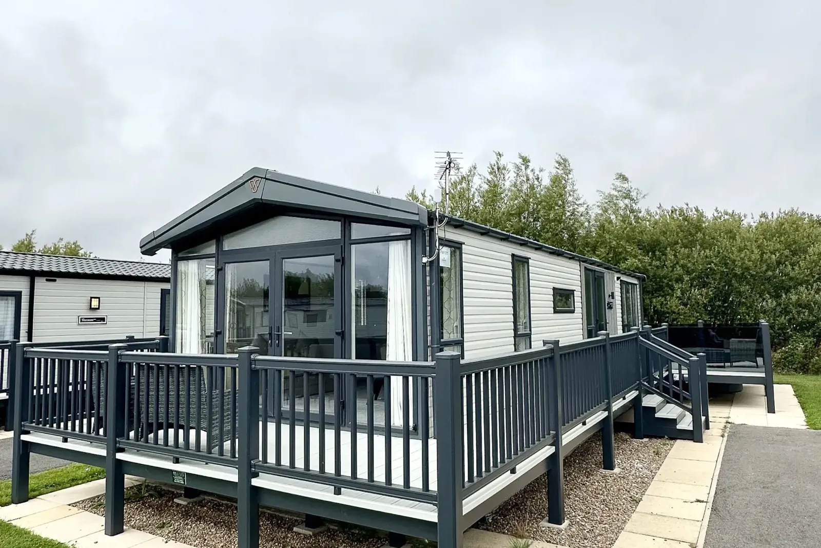Coastfields 2023 Victory Lakewood Lodge exterior with decking