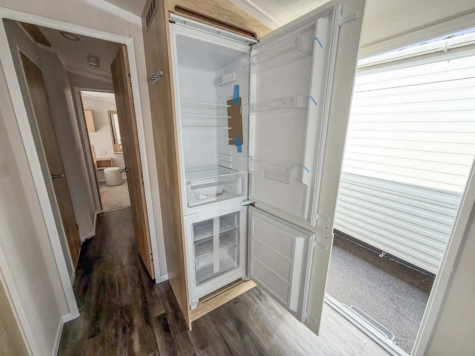Coastfields 2024 Swift Burgundy Kitchen Fridge Area at North Shore