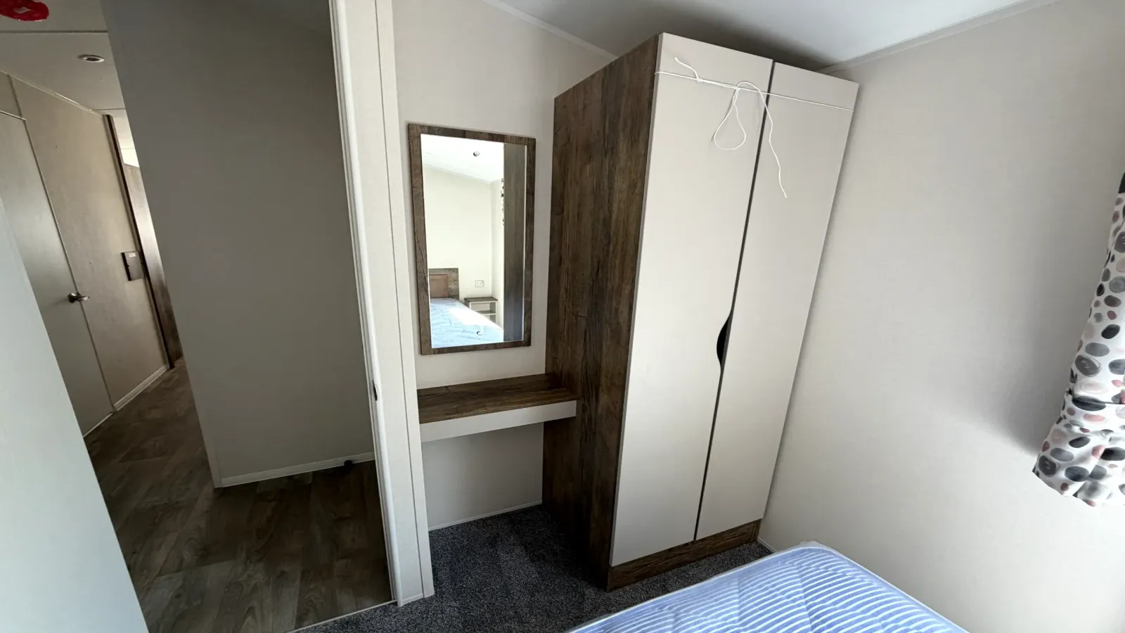 Text for iCoastfields 2026 Willerby Malton master bedroom storage at North Shore Holiday Park 