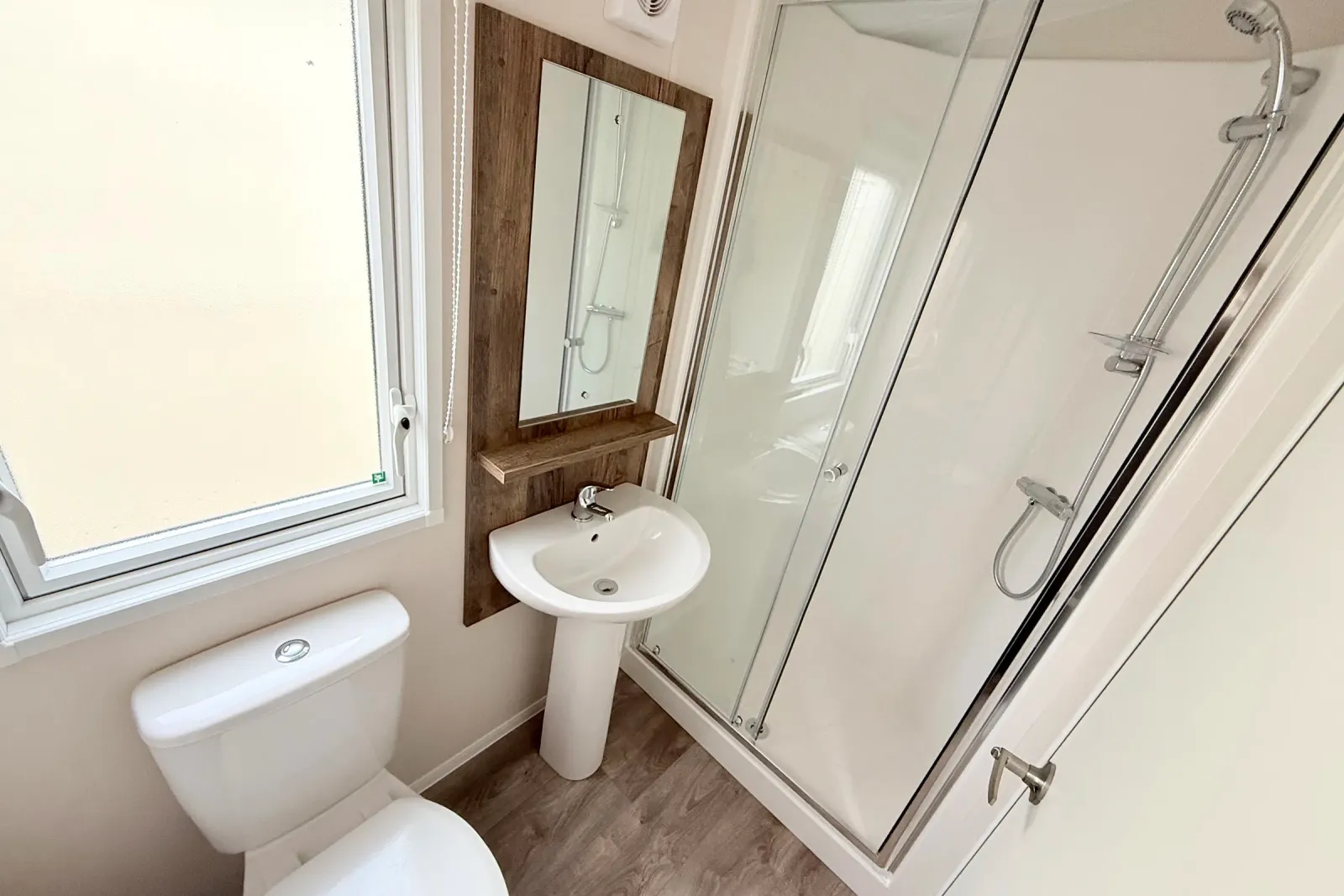 Modern family shower room with enclosed shower, washbasin and toilet in the 2026 Willerby Malton