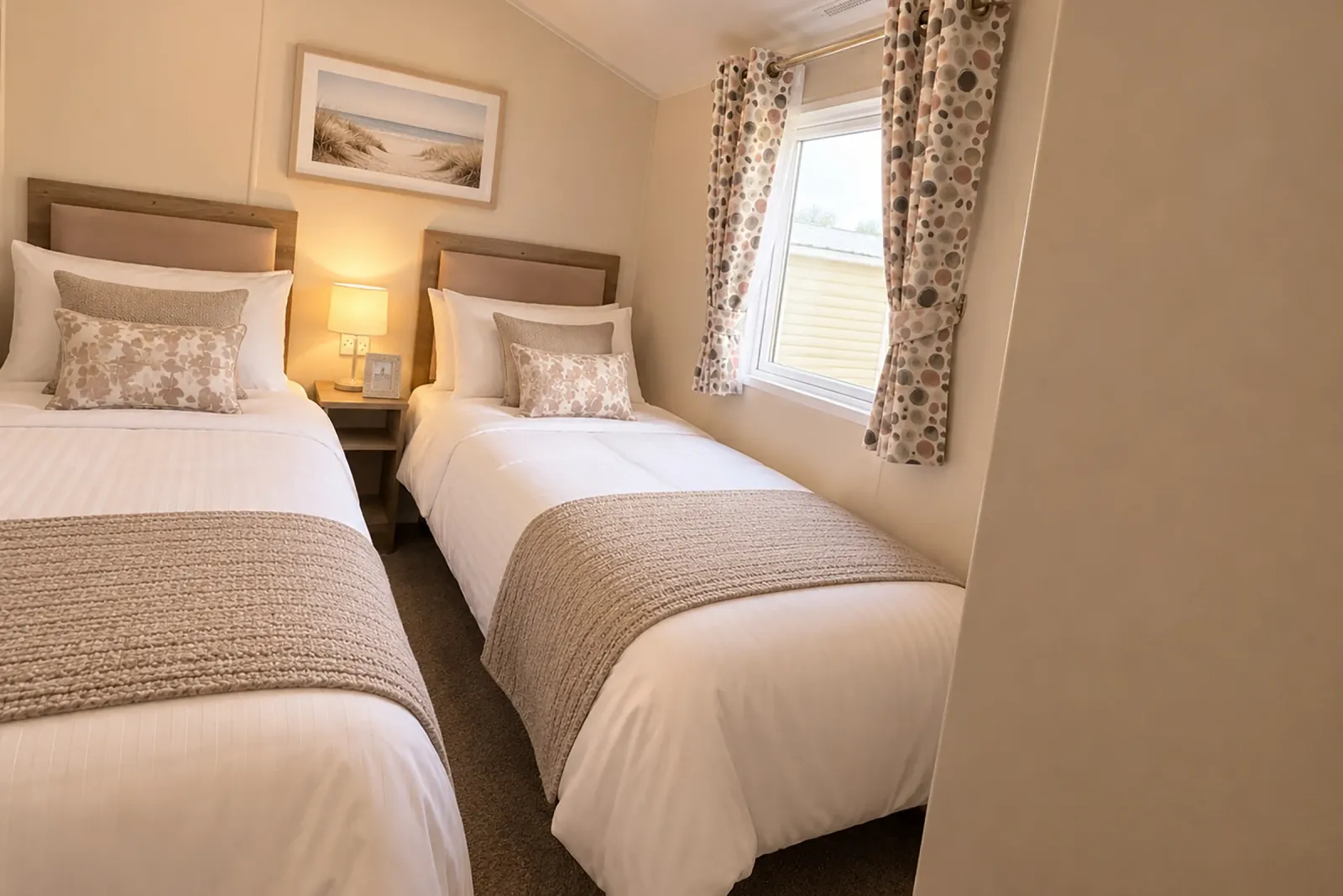 TTwin bedroom with coordinated neutral bedding and bedside lighting in the 2026 Willerby Malton static caravan