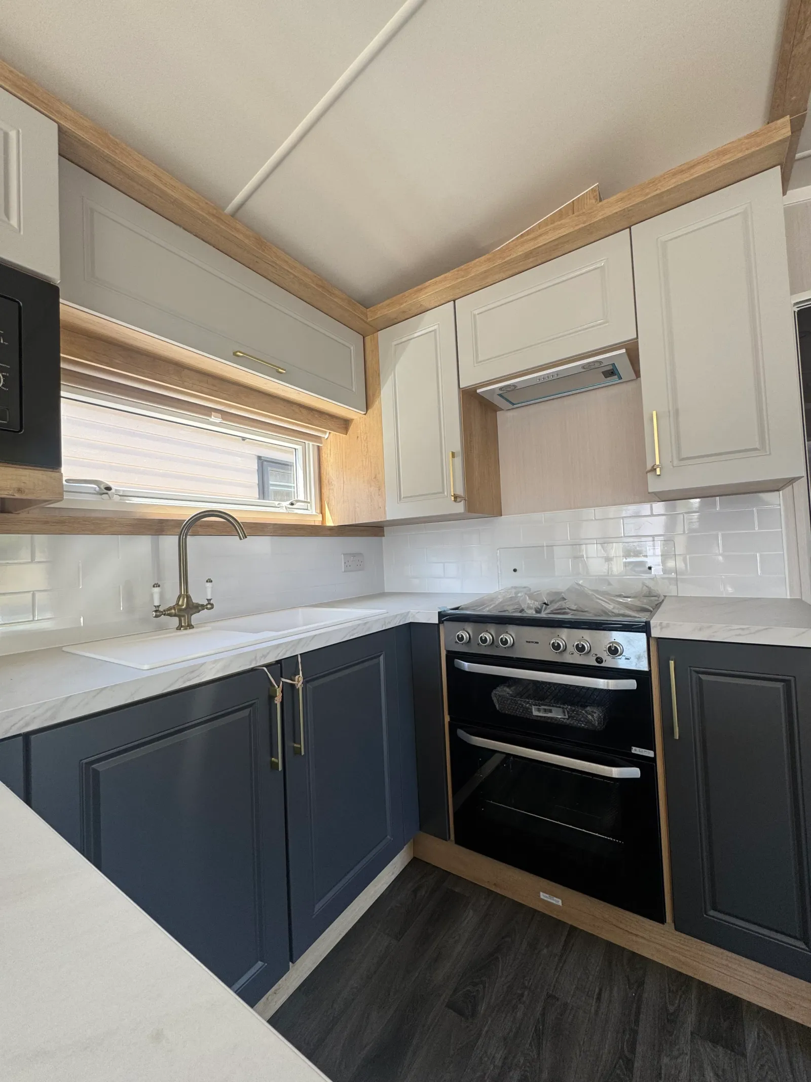 Modern U-shaped kitchen with integrated appliances in the 2026 Swift Bordeaux