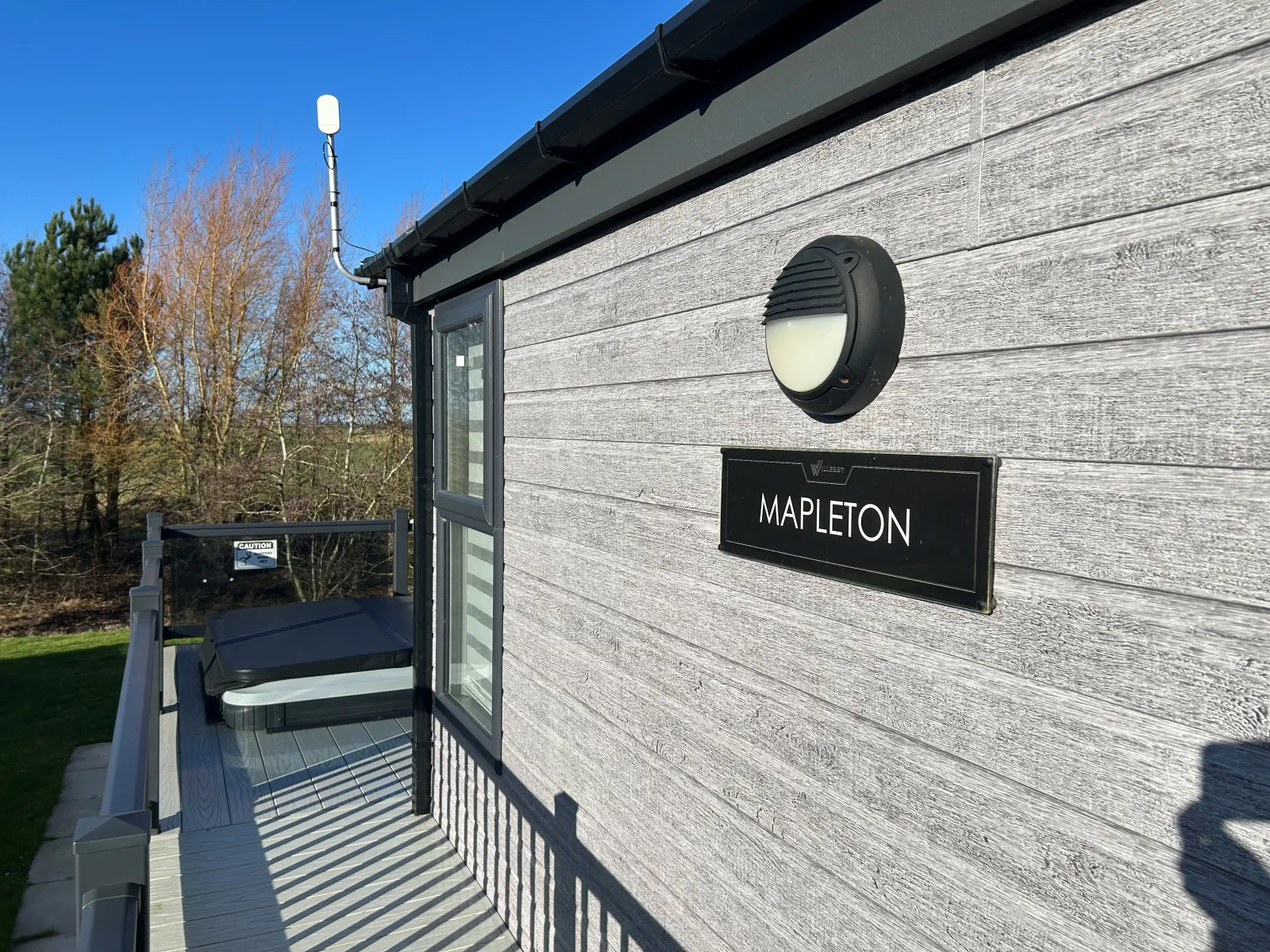 Private hot tub on the decking of the 2021 Willerby Mapleton lodge