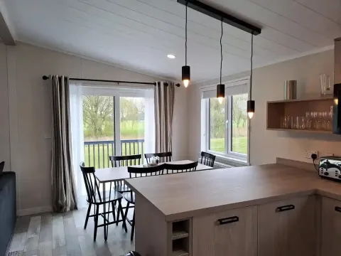 Addlethorpe Golf & Country Club-Muirfield-Faraday-dining area-kitchen-golf course view