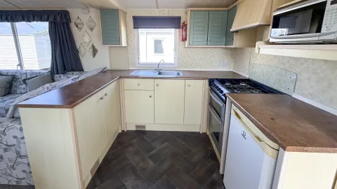Well-planned kitchen in the 2007 Atlas Lakeland Super holiday home.