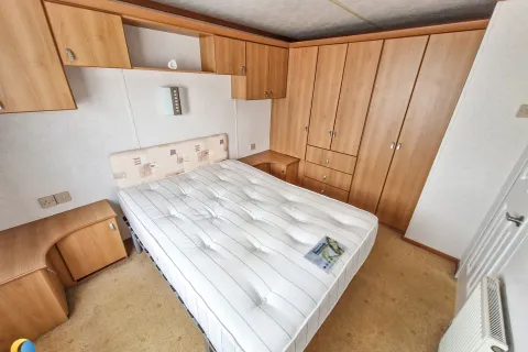 Coastfields 2007 Carnaby Dovedale main double bedroom with fitted storage