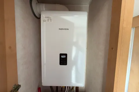 Wall-mounted heating appliance in a cupboard in the 2008 Pemberton Sovereign