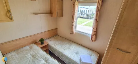 Coastfields 2012 Willerby Rio Gold twin bedroom with storage