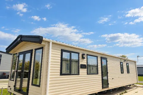 2016 ABI Sunset Coastfields lounge with French doors overlooking fishing lake