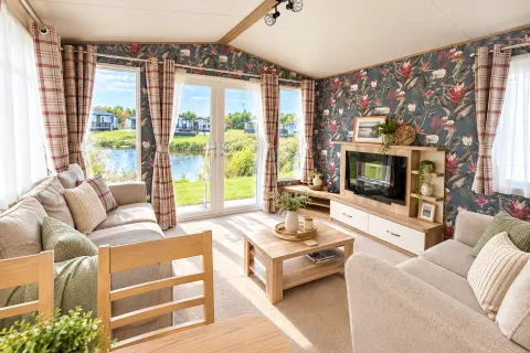 2016 ABI Sunset Coastfields lounge with French doors overlooking fishing lake
