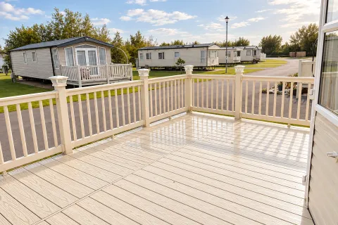 2016 Willerby Brockenhurst Coastfields exterior with extensive wraparound decking