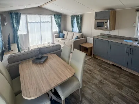 Bright open-plan lounge inside the 2022 Willerby Malton holiday home.