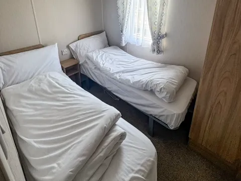 Twin bedroom providing comfortable guest accommodation in the Willerby Malton.