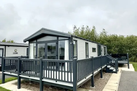 Coastfields 2023 Victory Lakewood Lodge exterior with decking