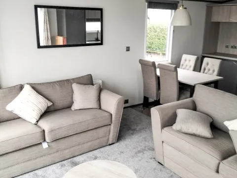 Bright and contemporary living area in the 2023 Victory Lakewood Lodge