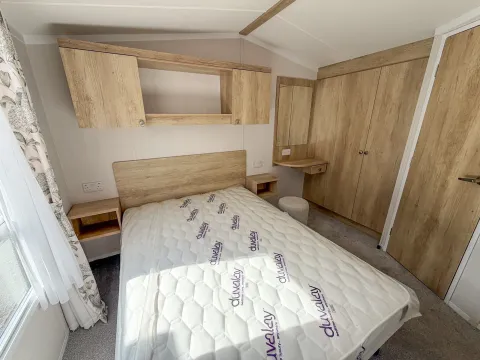 Coastfields 2024 Swift Burgundy Master Bedroom at North Shore