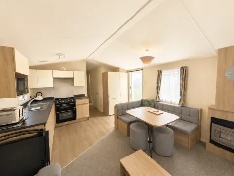North Shore Silver Caravan with decking Sleeps 8 pet friendly