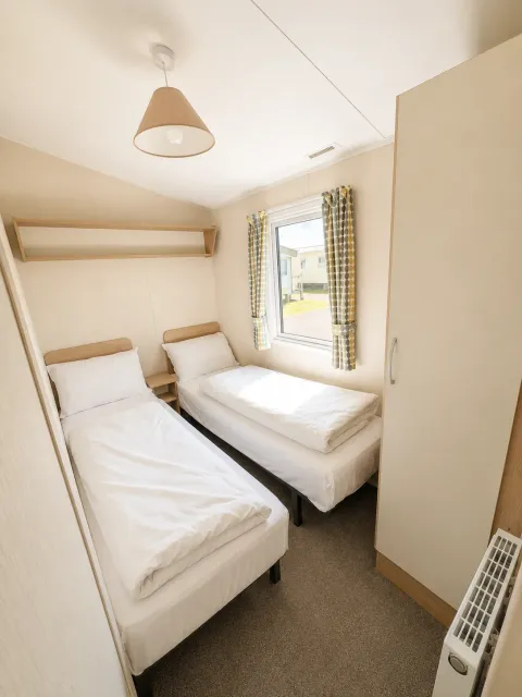 North Shore Silver Caravan with decking Sleeps 8 pet friendly
