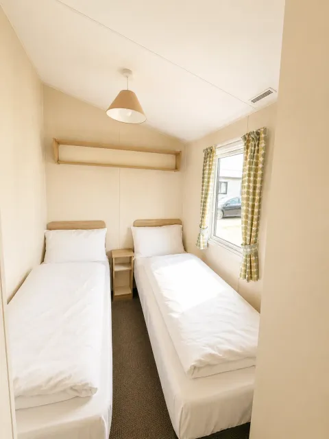 North Shore Silver Caravan with decking Sleeps 8 pet friendly