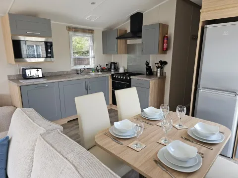 Smallgrove platinum caravan sleeps 8_Small Grove Holiday Park-Ingoldmells-holiday home-dining-kitchen 2_Small Grove