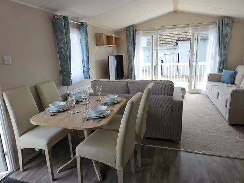 Smallgrove platinum caravan sleeps 8_Small Grove Holiday Park-Ingoldmells-holiday home-dining-lounge 1_Small Grove