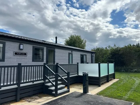 Large decking outside the 2023 Willerby Portland Lodge