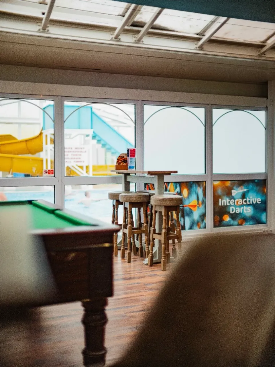 Coastfields Aqua Lounge table Pool View to Pool