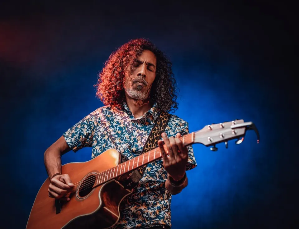 middle-aged-hispanic-man-musician-playing-guitar-o-2025-01-26-18-41-10-utc.jpg