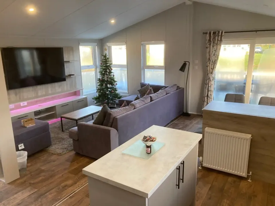 Modern kitchen with central island in the 2023 Willerby Mapleton Lodge