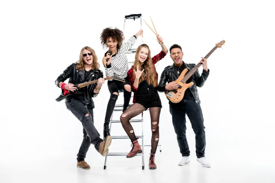 young-rock-and-roll-band-posing-with-ladder-holdin-2024-11-17-14-34-26-utc.jpg